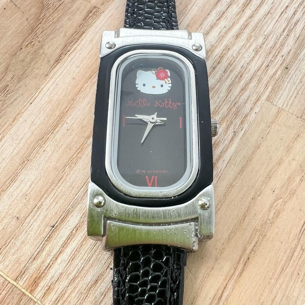 Sanrio hello Kitty ladies silver tone black leather watch NEW BATTERY